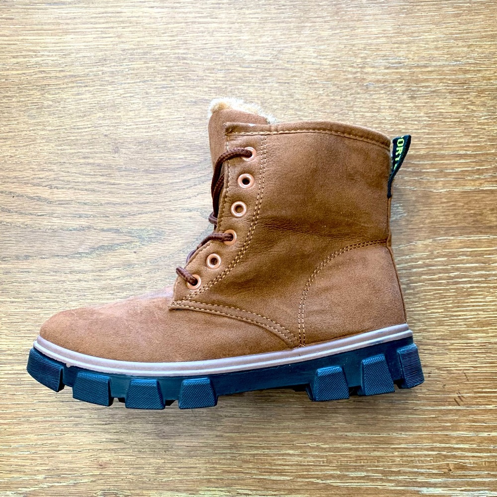 Faux shearling lined lace up lug sole boots